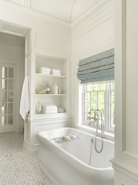 A bathroom with paneling is pretty high up on my “swoon-worthy” list. However, this bathroom surpasses that mark by integrating some cool shelving into the paneling around the tub, creating a truly bespoke and luxurious feeling. See other Master Bathtub Ideas. #luxurybathrooms, #traditionalbathroom, #whitebathrooms Master Bathtub Ideas, Bathroom Freestanding, Bad Inspiration, Bad Design, Bath Tub, Traditional Bathroom, Bathroom Remodel Master, Free Standing Bath Tub, Beautiful Bathrooms