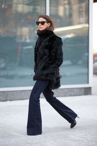 Bell bottoms faux fur turtleneck sweater glasses heels  Best New York Fashion Week Street Style Fall 2015 - NYFW Street Style Fur Coat Outfit Black, Black Fur Jacket Outfit, Black Fur Coat Outfit, Faux Fur Coat Outfit, Fur Jacket Outfit, Black Fur Jacket, Fur Coat Outfit, Coat Elegant, Black Fur Coat