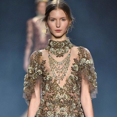 Marchesa on Instagram: "A moment from the #MarchesaArchives, the tulle fishtail gown with cape sleeves embellished in antique gold and bronze floral embroidery opens the Fall 2016 Marchesa runway show. #FW16Marchesa #Marchesa" Gown With Cape, Fishtail Gown, Cape Sleeves, Runway Show, Marchesa, Fall 2016, Floral Embroidery, Antique Gold, The Fall