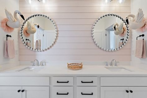 We are sharing our girls pink shiplap bathroom over on the blog! We found the best pink paint around and can't wait to share how we transformed the girls bathroom and gave it this custom look without a high price tag! #pinkshiplap #shiplap #pinkpaint #bestpinkpaint #bathroomdesign #bathroomdecor Pink Shiplap Bathroom, Shiplap Wall Bathroom, Pink Shiplap, Best Pink Paint, Kids Bathroom Makeover, Bathroom Pink, White Quartz Counter, Shiplap Bathroom, Bathroom Accent Wall