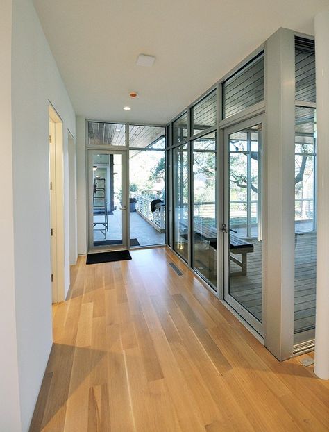 50/50 rift cut/quarter sawn white oak with a clear coat finish. KHouse Modern Hallway Life Of An Architect, Mcm House, Quarter Sawn White Oak, White Oak Floors, Modern Hallway, An Architect, Microsoft Outlook, Oak Floors, Modern Interiors