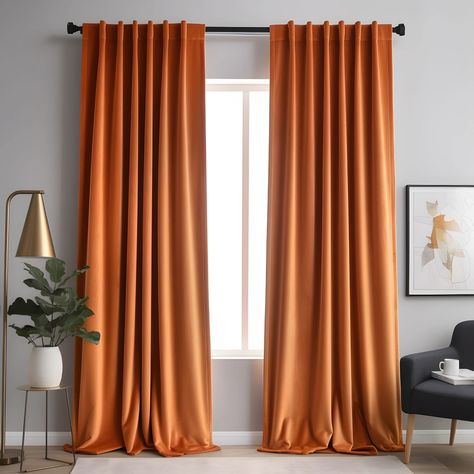 PRICES MAY VARY. WELL MADE: Package includes 2 panels of W52"x L84"(132cm x 214cm) each | W104"x L84"(264cm x 214cm) in total. Velvet curtains have a soft and luxurious feel. HANGING OPTIONS: Each velvet curtain panel has 2 top style design. Both rod pocket and back tab style per panel each with 3.1 inch inner diameter fit most standard rod. 3 hanging options for your needs. CLASSIC ELEGANT DESIGN: Made of silky velvet material that's soft and plush,Elegantly designed with both classic and moder Burnt Orange Curtains Bedroom, Dark Orange Curtains, Burnt Orange Curtains Living Rooms, Colors That Go With Burnt Orange, Orange Velvet Curtains, Terracotta Curtains, Burnt Orange Curtains, Scale Texture, Orange Curtains