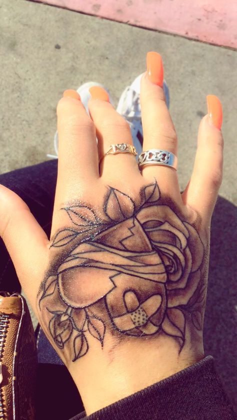 Broken Heart Hand Tattoo Heart On My Sleeve Tattoo Ideas, Hand Tattoos For Women Heart, Small Hand Cover Up Tattoo, Heart Hand Tattoos For Women, Cover Up Tattoos On Hand, Hand Tattoos Heart, Beautiful Ankle Tattoos, Heart On Hand Tattoo, Creative Hand Tattoos