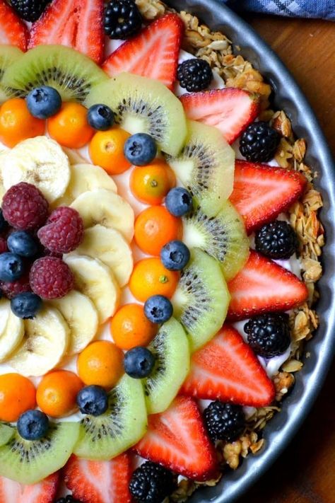 This Beautiful Breakfast Tart has a gluten free granola crust filled with thick Greek yogurt, and topped with a colorful sunburst of fresh juicy fruit. #recipe #easy #tart #healthy #fruittart #glutenfreetart #granola #yogurtparfait #breakfast #brunch #mother'sDay #Easter #glutenfree Granola Crust, Breakfast Tart, The View From Great Island, Beautiful Breakfast, Fruit Breakfast, What's For Breakfast, Breakfast Brunch Recipes, Betty Crocker, Fruit Recipes