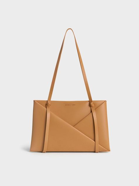 Camel Midori Geometric Tote Bag | CHARLES & KEITH Black Saddle Bag, Chic Crossbody Bag, Stylish Purse, Classic Handbags, Luxury Bag, Charles Keith, Zip Wallet, Everyday Bag, Sustainable Materials