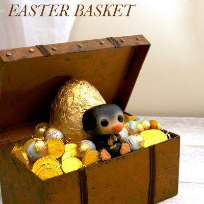 Niffler Easter basket | Fantastic Beasts and Where To Find Them Harry Potter Easter Basket Ideas, Harry Potter Easter Basket, Harry Potter Suitcase, Cauldron Cakes, Trunk Suitcase, Luggage Trunk, Cumpleaños Harry Potter, Harry Potter Food, Fantastic Beast