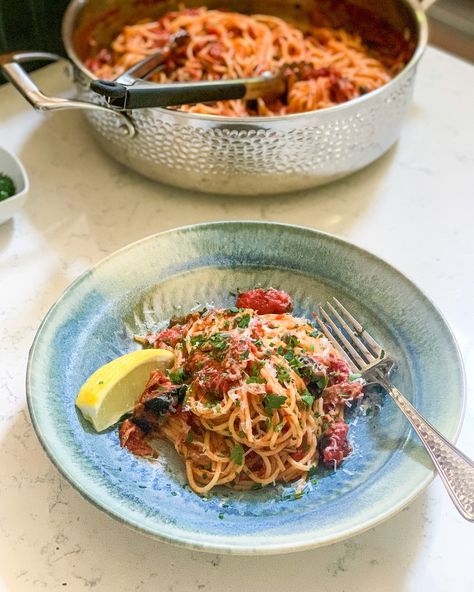 This people-pleasing Pasta all Puttanesca is a quick recipe that's easy to pull together in a pinch. Spaghetti Tuna Puttanesca substitutes the traditional anchovies for tuna which is sure to make it more enjoyable for lots of people. Puttanesca is a calassic Italian pasta sauce with tomatoes, garlic, capers, olives, chili flakes and anchovies. In my experience, not everyone loves anchovies like I do and tuna is usually more easily accessible so it's a great substitute. Either way, this is a... Pasta Sauce With Tomatoes, Italian Pasta Sauce, Blue Jean Chef, Types Of Olives, Canning Whole Tomatoes, Quick Pasta, Drying Pasta, Spaghetti Recipes, Minced Onion