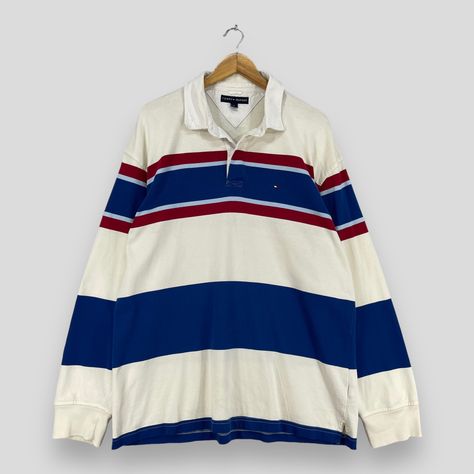 Vintage TOMMY HILFIGER Polo Rugby Shirt Xlarge 1990s Tommy Hilfiger Border Stripes Multicolor Streetwear Tommy Jeans Rugby Shirt Size XL *All measurements are taken with the garment flat on the ground. SIZE ON TAG :- Size XL ACTUAL SIZE MEASUREMENT :- ARM PIT TO ARM PIT :- 24" inches BACK COLLAR TO HEM :- 31" inches CONDITION :- GREAT USED CONDITION. NO HOLES AND STAINS. REF : (05-06-2021) 1150 Vintage Polo Shirt, Polo Rugby Shirt, Tommy Hilfiger Vintage, Tommy Hilfiger Polo, Vintage Tommy Hilfiger, Rugby Shirt, Tommy Jeans, Used Clothing, Vintage Shirts