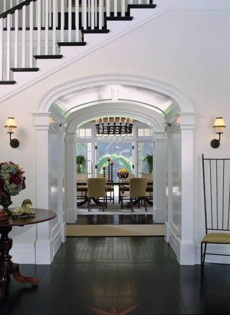 Dutch Colonial in California by Tommy Chambers Interiors. Walkway Under Stairs, Traditional Hallway, Arched Doorway, Entry Stairs, Dream Ideas, Villa Plan, Casas Coloniales, Dutch Colonial, Houses Architecture