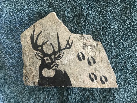 Heavy, rugged rock with deer and hoof prints painted on Deer Painted On Rocks, Deer Painted Rocks, Rock Art Ideas, Hoof Print, Deer Painting, Rock Painting Designs, Rock Painting Art, Deer Head, Rock Painting Ideas