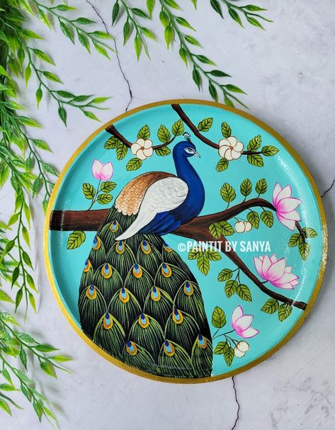 Embrace the elegance of a peacock pichwai painting wall plate, bringing art and positive vibes to your space. 🦚✨ #peacockpainting #pichwai #wallplate #wallplates #festivedecor Pichwai Art Peacock, Round Pichwai Painting, Peacock Pichwai Painting, Simple Pichwai Painting, Pichwai Shrinathji Painting, Pichwai Paintings Peacock, Pichwai Wall Art, Pichwai Wall Painting, Pichwai Rangoli