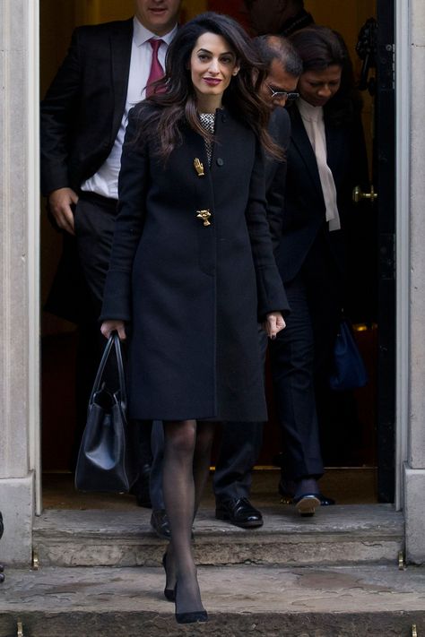 23 January Amal Clooney was pictured arriving at 10 Downing Street for a meeting with the Prime Minister wearing a smart black coat with sculptural buttons and classic court shoes. - HarpersBAZAAR.co.uk 10 Downing Street, Amal Alamuddin, 23 January, Classy Wardrobe, Business Clothing, Smart Casual Work, Fashion Highlights, Jaime King, Lawyer Fashion