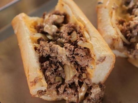 There’s always something new and delicious to try at this sandwich joint, and the Woodrow’s Whiz Wit is just one example. Chef and owner Kevin Kramer adds his own twist on the classic Philly cheesesteak with his homemade cherry pepper mayo. “The cherry pepper mayo has a little bit of acidity,” Guy said, “which is really key and essential.” Cheesesteak veterans and newbies alike will also fall for the homemade whiz, which is a creamy cheese sauce that’s traditionally served on top of the shaved b Cherry Pepper Mayo, Creamy Cheese Sauce, Pepper Mayo, Cheese Whiz, Bbq Brisket, Brisket Sandwich, Chicken And Biscuits, Sandwich Shop, Philly Cheesesteak