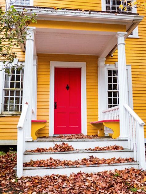 Yellow House with Red Door During Autumn Houses With Orange Doors, Yellow House Front Door, Yellow House With Red Door, Red Brick Yellow Door, House With Red Door, Yellow House Wood Door, Red Door Yellow Door, Red Door House, Vintage Houses