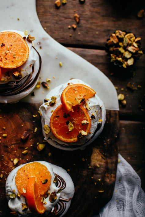 chocolate swirled citrus mini pavlovas — the farmer's daughter | let's bake something Chocolate Swirls, Mini Pavlovas, Bake Something, Chocolate Swirl, Fruity Desserts, My Favourite Things, Pavlova, Something Sweet, Meringue