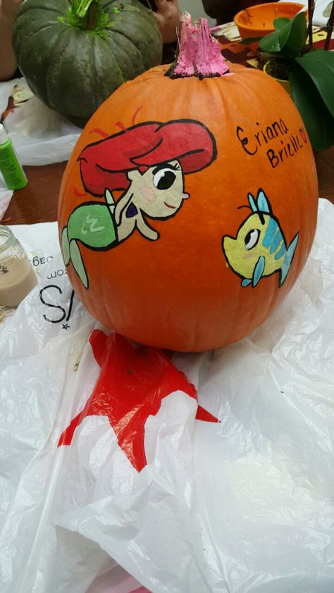 Ariel and flounder pumpkin Flounder Pumpkin, Ariel And Flounder, Pumkin Carving, Carving Ideas, Pumpkin Carving, Ariel, Watermelon, Christmas Bulbs, Carving