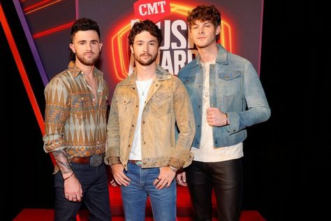 Colton Pack, Garrett Nichols and Zach Beeken of musical group Restless Road attend the 2021 CMT Music Awards at Bridgestone Arena on June 09, 2021 in Nashville, Tennessee. (Photo by Jason Kempin/Getty Images for CMT) Be still my heart, Restless Road definitely know how to bring out the tears. The trio recently released their latest single, "Growing Old With You" which has fans excited for their new material. The band showcases their beautiful melodies, with lyrics that make you want to grab your Restless Road, Charles Kelley, Yours Lyrics, Be Still My Heart, Country Scenes, Country Men, Keep The Faith, Musical Group, Round The World