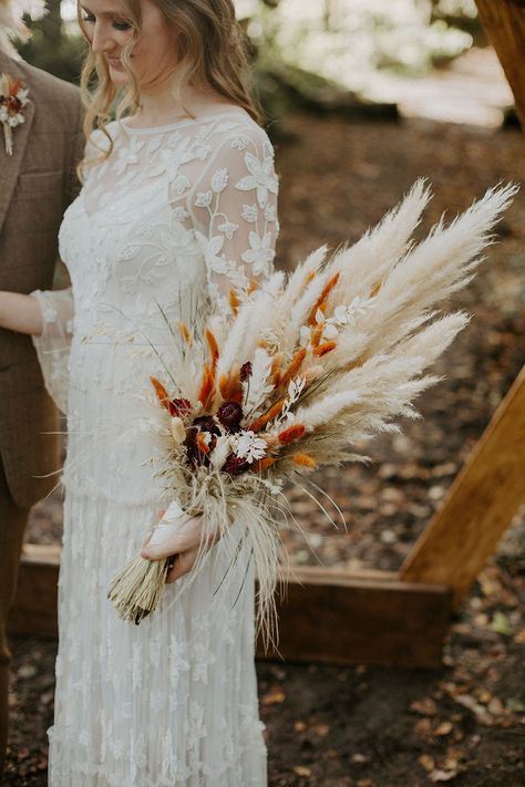 Would like to add burgundy and green. Love the shape, the copper orange, and the smaller pampas-like poofs Boho Wedding Ideas, Dried Flowers Wedding, Boho Wedding Bouquet, Grass Wedding, Wedding Abroad, Hand Bouquet, Whimsical Wonderland Weddings, Dried Flower Bouquet, Festival Wedding