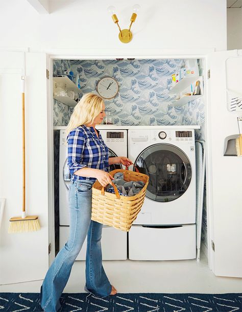 Go bold in the laundry room with an oh-so-appropriate wallpaper like this blue wave-patterned one. | Designer: Emily Henderson Design Blue Laundry Room, Wallpaper Waves, Laundry Closet Makeover, Closet Wallpaper, Laundry Organizers, Utility Closet, Design Darling, Laundry Room Doors, Urban Interiors