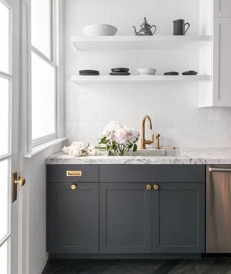 Modern kitchen with gray wood cabinets, open shelving and a subway tile backsplash. Dark Wood Kitchen Cabinets, Simple Kitchen Remodel, Kitchen Ikea, Dark Wood Kitchens, White Floating Shelves, Marble Kitchen, Gray Cabinets, Dark Kitchen, New Kitchen Cabinets