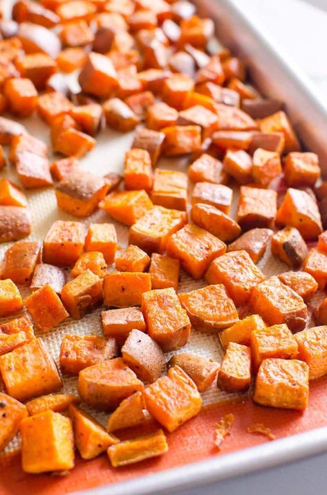 These easy Roasted Sweet Potatoes are made with simple spices, are soft on the inside and crispy on the outside. Roasted sweet potatoes are perfect as a side dish, in a wrap or in a salad during the fall and winter months. Sweet Potatoes In The Oven, Side Dishes For Ribs, Potatoes In The Oven, Sweet Potato Recipes Roasted, Potatoes Crispy, Oven Roasted Sweet Potatoes, Sweet Potato Recipes Healthy, Baked Sweet Potatoes, Sweet Potato Black Beans