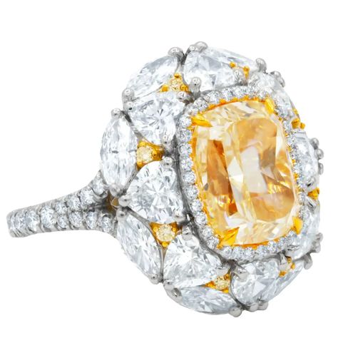 GIA Certified 5.01 Carats Canary Yellow Diamond Ring For Sale at 1stDibs | 8 carat canary diamond ring Canary Diamond Ring, Canary Yellow Diamonds, Orange Diamond, Yellow Diamond Ring, Canary Diamond, Yellow Diamonds, Yellow Diamond Rings, Bracelets Design, Fancy Yellow Diamond