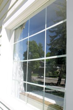 How to update boring windows using electrical tape - The Wicker House Electrical Tape Window Pane, Fake Window Panes, Large Living Room Window, Faux Window Panes, Window Grills, Garage Windows, Modern Window Grill, Romantic Kitchen, Window Grids