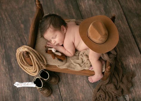 Newborn cowboy photoshoot #babyphotography #newbornphotography #babycowboy Cowboy Themed Newborn Pictures, 3 Month Old Cowboy Pictures, Cowboy Newborn Photos, Cowboy Milestone Pictures, Newborn Cowboy Photoshoot, Baby Burrito Photoshoot, Mexican Newborn Photoshoot, Newborn Cowboy Photography, Cowboy Newborn Photography