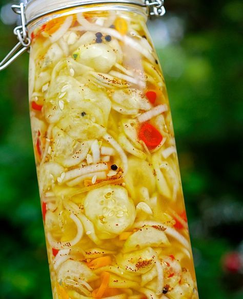 sweet & spicy garlic refrigerator pickles | ChinDeep Sweet Pickled Garlic Recipes, Pickle Veggies, Cold Cellar, Spicy Refrigerator Pickles, Homestead Canning, Pickled Vegetables Recipe, Pickled Foods, Zucchini Pickles, Pickle Recipes