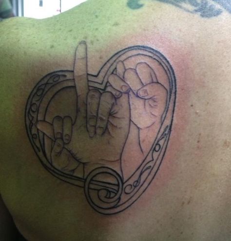 i love.you in sign language.tattoos | my daughters holding my fingers as I sign love you in American Sign ... I Love You Asl Tattoo With Flowers, Sign Language Tattoo Ideas, Asl Tattoo, Language Tattoos, Sign Language Tattoo, Heart Hand Sign, Sign Language Art, Love Yourself Tattoo, Awareness Tattoo