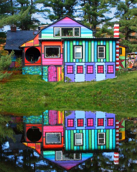 This farmhouse got an eye-popping makeover! See the before and after photos. Colorful House, Rainbow House, Pintura Exterior, Colorful Places, Unusual Homes, Colourful Buildings, Fantasy House, Amazing Architecture, Exterior Paint