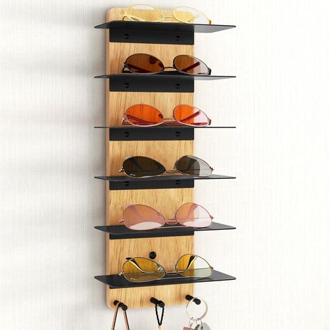 PRICES MAY VARY. 【Convenient Storage】- Put your sunglasses on this sunglass holder to avoid cluttering your desk or drawer and make it easier to choice your glasses. 【More Than for Sunglasses】- This sunglasses display can hold other things such as wallets, etc. The three bottom hooks can also be used to store keys, umbrellas and other items. Avoid forgetting something when you go out. 【Upgraded Design】- Wood sunglasses organizer storage is made of high quality wood and solid metal, stable and st Sunglasses Storage Organizers, Sunglasses Organizer, Eyeglasses Holder, Sunglasses Display, Sunglasses Storage, Sunglasses Holder, Rustic Wood Walls, Wood Sunglasses, Living Room Entryway