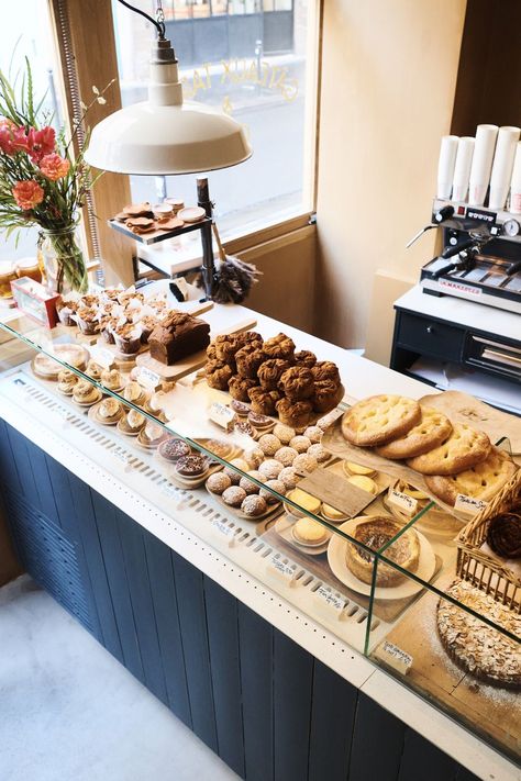 a counter with a variety of desserts on it inside a bakery French Baked Goods, Paris Bakeries, Bakery Counter, Vanilla Flan, Paris Bakery, Paris Brest, Best Bakery, French Bakery, Pastry Shop