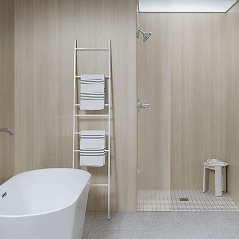 Characterized by straight grain intermingled with subtle cathedrals in an overall light neutral color with subtle contrast. #wetwallpanels #showerpanels #interiordesign #bathroomdesign #bathroom #wetwall #vanityunit #bathroomdecor #wilsonart #antimicrobial #groutfree #renovation #tiles #bathroomrenovation #bathroominspo #bath #marble #tiles #bathroomtiles #luxury #luxurybathroom #bathroomstyle #designinspiration #bathroominterior #interiordecorating #showerdesign #modernbathroom #tiledesign Wetwall Bathroom Panels, Wetwall Bathroom, Bathroom Panels, Wall Panel System, Bathroom Paneling, Bathroom Inspo, Marble Tiles, Bathroom Style, Shower Design