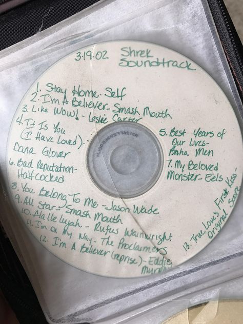 I was cleaning the apartment and found this Shrek Soundtrack that my mom burned for me when I was 6/7. Cd Idea, Cd Storage, 2000s Aesthetic, Save Room, Good American, Shrek, Mixtape, Album Art, Art School