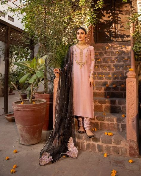 MAYA Pret-a-Porter on Instagram: "Humnawa | An Ode To Timeless Rhythms. Gulshan: This dreamy lilac and black Indian raw silk canvas is customary with ethnic elements laid in eye-catching shimmering sequins and dabka work. Accompanied by an array of exquisite border. Paired with a diaphanous, hand applique organza dupatta and raw silk chori dar pajama. This mesmerizing design is nothing short of being a show stopper. Launching on 28th December at 7 PM, Get ready to upgrade your wardrobe. Muse Dabka Work, Desi Wedding Dresses, Black Indians, Eid Dresses, Luxury Wear, Organza Dupatta, Wedding Formal, 12 Weeks, Festival Dress