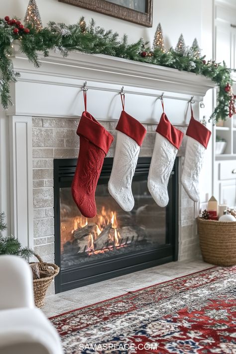 Transform your living room into a festive haven with these 21+ fireplace decor ideas for Christmas 2024! Create a cozy and magical holiday ambiance with garlands adorned with twinkling fairy lights, stockings in classic red and white, and elegant ornaments. Go for a rustic farmhouse vibe with natural greenery, pinecones, and plaid accents, or opt for a chic modern look with metallic gold and silver decor. #FireplaceDecor #ChristmasDecor2024 #HolidayHomeIdeas #FestiveFireplace Decor Ideas For Christmas, Festive Fireplace, Fireplace Decor Ideas, Elegant Ornaments, Ideas For Christmas, Silver Decor, Cozy Holiday, Holiday Red, Fireplace Decor