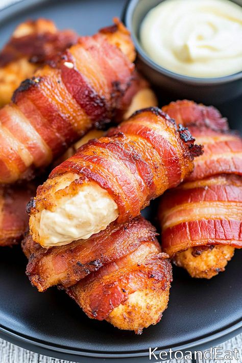 Bacon Wrapped Chicken Tenders  Recipe Air Fryer Bacon Wrapped Chicken Tenders, Bacon Wrapped Chicken Tenderloins, Bacon Wrapped Chicken Oven, Bacon Wrapped Chicken Appetizers, Bacon Wrapped Cheese Sticks, Keto Bacon Wrapped Chicken, Juicy Chicken Tenders, Chicken Wrapped In Bacon, Keto Chicken Tenders