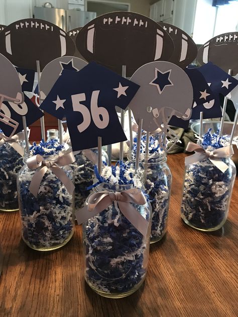 Turned out great for the centerpiece for the party. Diy Dallas Cowboys Party Decorations, Dallas Cowboys Table Decorations, Cowboys Birthday Party Decorations, Dallas Cowboy Backdrop Ideas, Cowboys Theme Party Dallas, Dallas Cowboys 50th Birthday Party, Dallas Cowboy Centerpieces Ideas, Dallas Cowboy Party Decorations, Dallas Cowboys Party Ideas Centerpieces