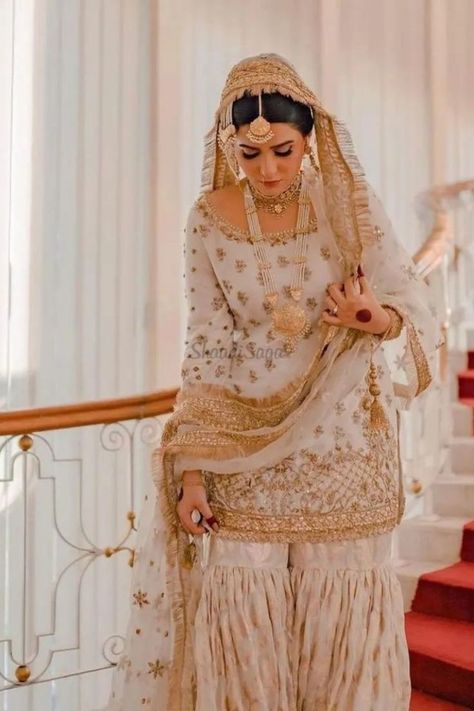 Introducing latest Gharara designs. From party wear Gharara to bridal gharara, we have got amazing designs for all. #shaadisaga #indianwedding #ghararadesignpakistani #ghararadesignindian #ghararadesigncotton #ghararadesignsimple #ghararadesignwhite #ghararadesignfrock #ghararadesignnet #ghararadesignpakistanibridalmehndidress #ghararadesignlatest #ghararadesignblack #ghararadesignbridal#ghararadesignblue #ghararadesignpink #ghararadesignheavy #ghararadesignpastel #ghararadesignorange White Gharara Designs, White Gharara Pakistani, Latest Gharara Designs, White Gharara, Gharara Pakistani, Bridal Gharara, Nikkah Outfit, Gharara Designs, Nikah Outfit