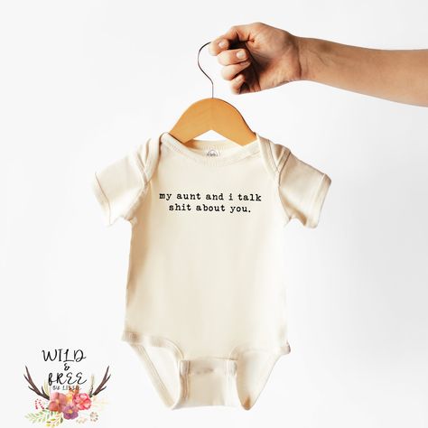 Excited to share this item from my #etsy shop: My Aunt and I Talk Shit About You Onesie, Aunt Onesie, Funny Baby Onesie, Gender Neutral Baby Clothes, Natural Color Bodysuit #auntbabyclothes #newbornbabyoutfit #funnyauntonesie #babyshowergift #auntshirt #funnybabygift #babyboyclothes #babygirlclothes Gender Neutral Onesie Vinyl, Aunt Onsies, Nephew Onesie, Funny Aunt Onesie, Gender Neutral Onesies, Neutral Baby Onesies, Aunt Baby Clothes, Onesie Designs, Aunt Onesie