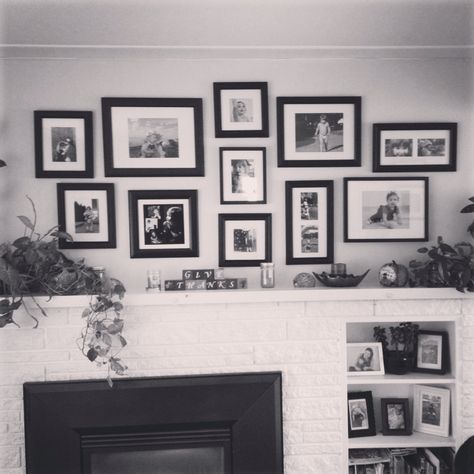 Photo wall with different sized black frames. Photo collage over mantel Multi Photo Frame, Above Fireplace, Picture Arrangements, Frame Wall Collage, House Before And After, Photo Wall Gallery, Collage Ideas, Multi Photo, Black Frames