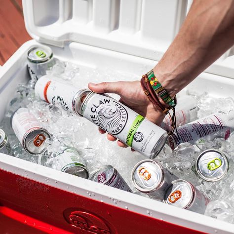 Fill your next summer cooler with something new--White Claw Hard Seltzer in three fresh flavors, Natural Lime, Black Cherry, and Ruby Grapefruit! Healthy Alcohol, White Claw Hard Seltzer, Spiked Seltzer, Beer Photography, Healthy Cocktails, Watermelon And Lemon, White Claw, Fancy Drinks, Hard Seltzer