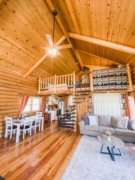 Our home is a one-room log cabin plus a small room for my son’s nursery. The cabin was built by hand 30 years ago and is complete with a beautiful wood stove, iron spiral staircase, and cozy loft. #housetour #hometour Log Cabin Loft Ideas Spaces, Simple Cabin With Loft, Small Cabin Floor Plans With Loft, Log Cabin Loft, Tiny Cabins Interiors, Cabin Layout, Lofted Cabin, Western House, One Room Cabin