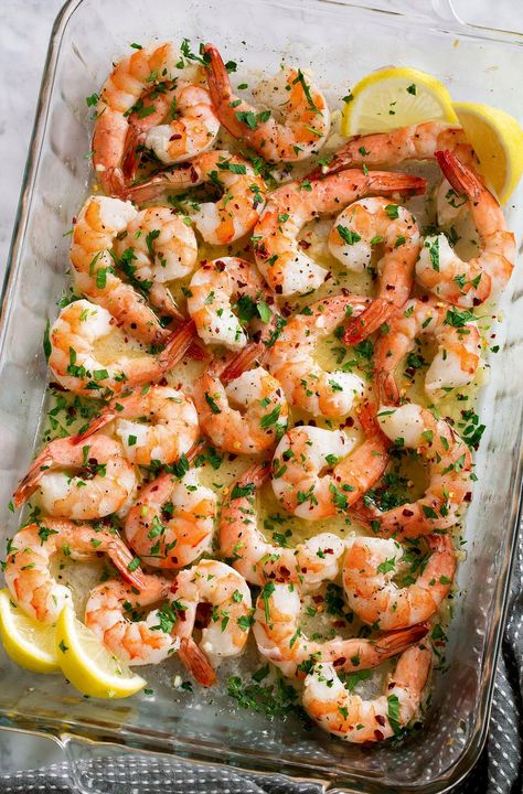 Indulge in the exquisite flavors of this Garlic Lemon Butter Shrimp Bake, a true masterpiece for seafood lovers. This dish combines succulent shrimp with a rich, buttery sauce infused with zesty lemon and aromatic garlic, creating a symphony of taste that is both refreshing and comforting. Perfect for a sophisticated dinner party or a cozy night in, this recipe is easy to prepare yet impressively elegant. Serve it with crusty bread or a side of pasta to soak up every last drop of the delicious sauce. Elevate your cooking repertoire with this delightful, classy dish that promises to be a hit at any table. Shrimp Bake, Lemon Butter Shrimp, Buttered Shrimp Recipe, Baked Shrimp Recipes, Baked Shrimp, Butter Shrimp, Lemon Butter Sauce, Seafood Pasta, Dinner Easy