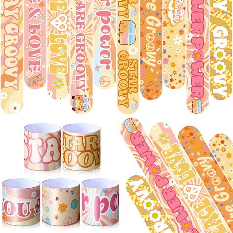 PRICES MAY VARY. Groovy Party Decorations: 40 pieces of groovy slap bracelets in 10 designs, tightly wrapped with soft faux leather type material on the outside, enough to meet your groovy birthday party needs Boho Rainbow Party Design: the boho rainbow slap bracelets are designed for groovy birthday parties, including hippie car, daisy, boho rainbow, peace wreath, printed with [peace and love], [you are groovy], [flower power], [star groovy], [groovy words], inspirational and attractive; Nice t Groovy Party Decorations, Two Groovy Party, Rainbow Snap, Boho Rainbow Birthday Party, Hippie Birthday Party, Bracelets Rainbow, Baby First Birthday Themes, Two Groovy, Girl Birthday Party Favors