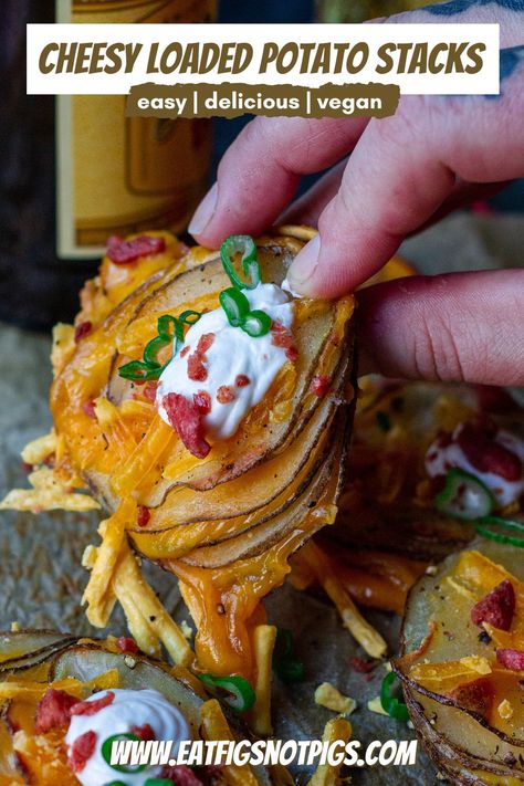 These delectable Cheesy Vegan Loaded Potato Stacks are the mini version of a loaded baked potato. Creamy vegan cheddar cheese is nestled between layers of thinly sliced potatoes then drizzled with melted butter and baked to golden, crispy perfection! Top the cheesy stacks with classic loaded baked potato toppings – sour cream, bac’n bits, and chives! Serve as fun, party appetizer or delicious side dish! Easy | Delicious | Vegan Baked Potato Toppings, Vegan Cheddar Cheese, Potato Stacks, Vegan Party Food, Loaded Baked Potato, Potato Toppings, Plant Based Snacks, Vegan Cheddar, Vegan Sour Cream