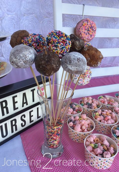 Perfect "floral" arrangement for your donut food table! Donut Holes Display Birthday, Donut Holes Display, Donut Bar Ideas, Donut Dessert Table, Donut Table, Donut Sprinkle, Donut Pool, Donut Display, Popcorn Mix