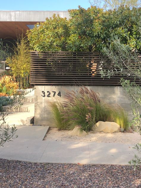 Corporate Landscape Design, Fence Design Front Yard, Mid Century Modern Fence Front Yards, Stucco Landscape Wall, Modern Driveway Entrance, Fence On Concrete Wall, Front Yard Wall, Sustainable Gardening Ideas, Concrete Fence Wall Modern