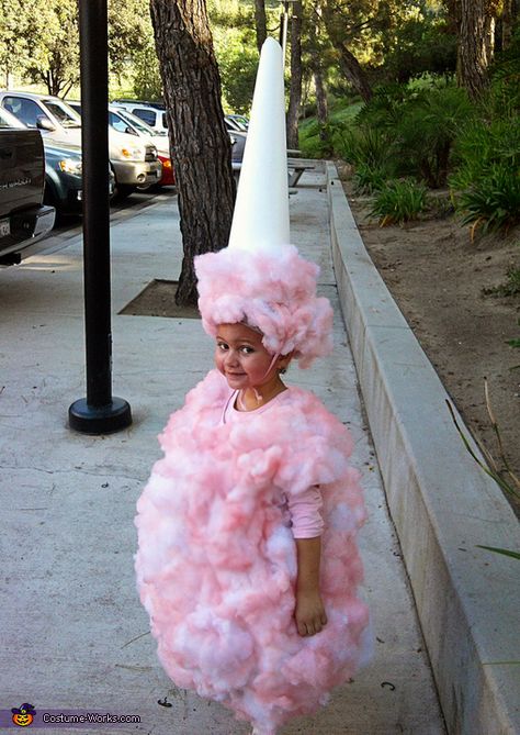 DIY Cotton Candy Costume.     Pink tshirt,  Pillow fill, Adhesive spray, Pink paint (for silk flowers),   Clown wig (with hair cut off and replaced with pillow fill),  light Poster board for cone,  Elastic to hold cone on head,   Pink polka dot knee highs, Blush and glitter for face + a cute kid! too cute!  @Sue Goldberg Ledezma, this is too funny@ Cotton Candy Costume, Geek Outfit, Candy Costume, Candy Costumes, Halloween Fest, Baby Kostüm, Diy Costumes Kids, Diy Halloween Costumes For Kids, Homemade Halloween Costumes